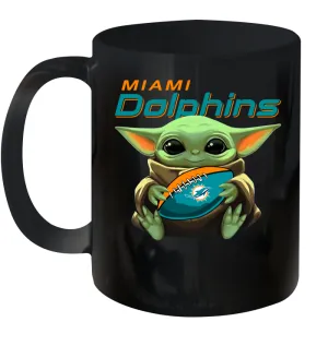 Baby Yoda Loves The Miami Dolphins Star Wars Baby Yoda Hugs Dolphins NFL Ceramic Mug 11oz