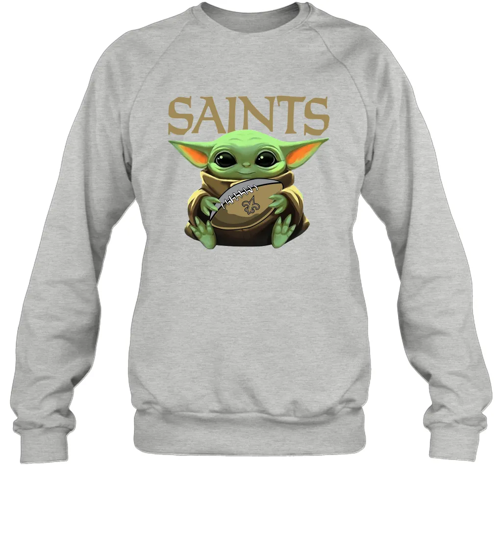 Baby Yoda Loves The New Orleans Saints Star Wars Baby Yoda Hugs Saints NFL Adult Sweatshirt